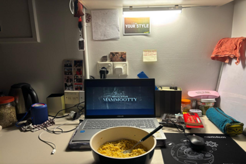 Student Adriparna's laptop and bowl of food in accommodation