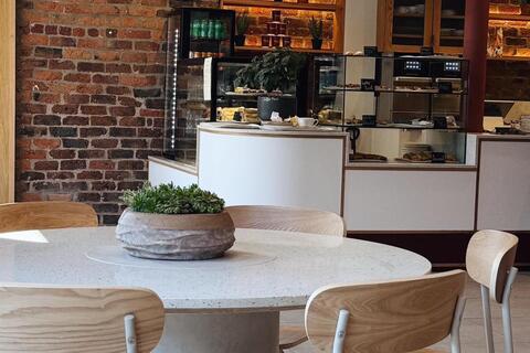 Table and chairs inside cafe
