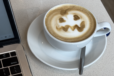 Cup of coffee on saucer in Hope Cafe