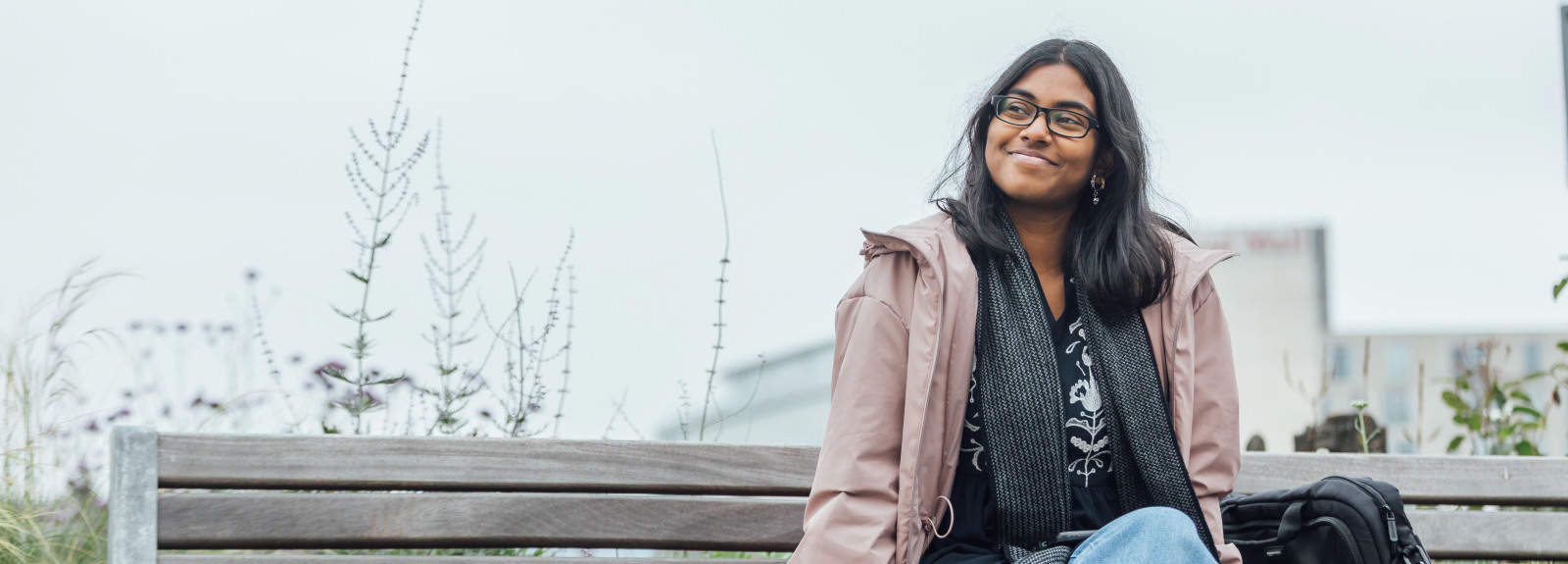 Student Florence sitting on bench