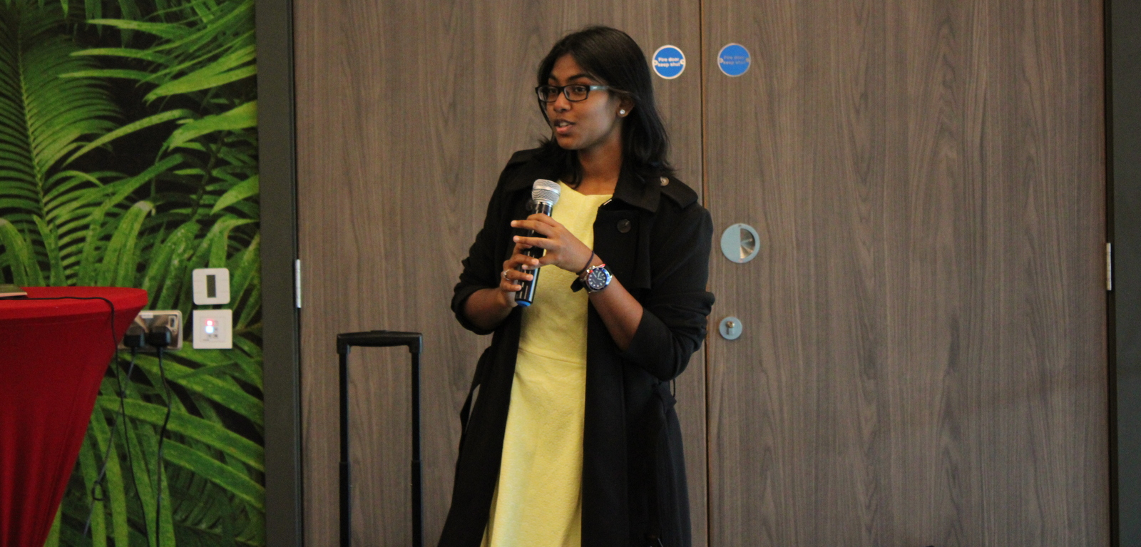 Student Florence speaking at event