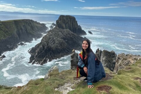 Student posing near rocks at Malin Head