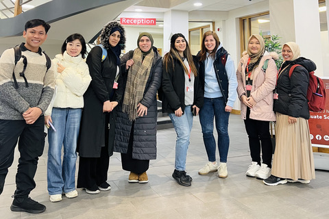 Group of PGR students in the Graduate School reception