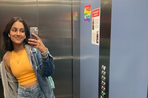 Student standing in elevator