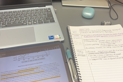 Student Reina's laptop, tablet and notebook