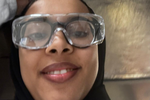 Student Sejoud in lab gear