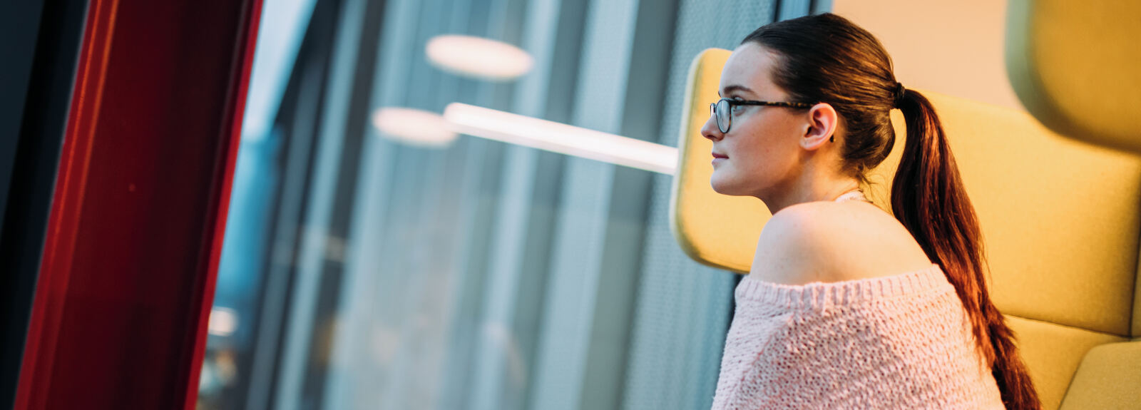Student looking out window